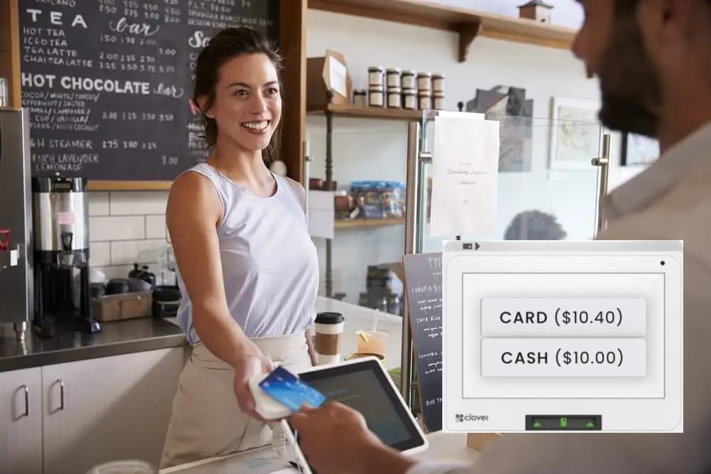 A customer paying by card while the checkout terminal shows the card price versus the lower cash price